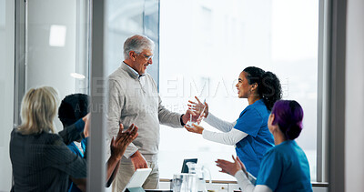 Buy stock photo Award, doctors and thank you with people in meeting for healthcare breakthrough, research grant and prize. Medical milestone, applause and support with nurses in hospital boardroom for trophy
