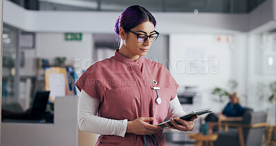 Buy stock photo Information, medical and tablet with nurse woman in clinic for insurance, records or schedule. App, healthcare and reading agenda with medicine professional in hospital for internship or residency