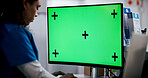 Computer, green screen and medical with nurse in hospital for file update or typing report. Healthcare, mockup and research with medicine professional in clinic for insurance, records or wellness