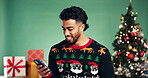 Christmas, smile or man with mobile in studio for holiday, festive season or gift shopping. Xmas, phone or happy person with app to purchase present online, sale discount or space on green background