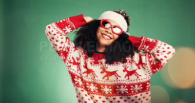 Buy stock photo Happy woman, portrait or christmas with sunglasses in studio for festive on a green background. Face, female person or model with smile in fashion santa for december holiday or celebration on bokeh