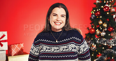 Buy stock photo Smile, Christmas and portrait of woman in studio for holiday season, celebration and winter break. Happiness, festive tradition and Xmas with female person on red background for December vacation