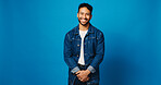 Smile, fashion and portrait of man on blue background for trendy style, casual clothes and confidence. Mockup space, studio and person with positive attitude, happy and pride in denim for aesthetic