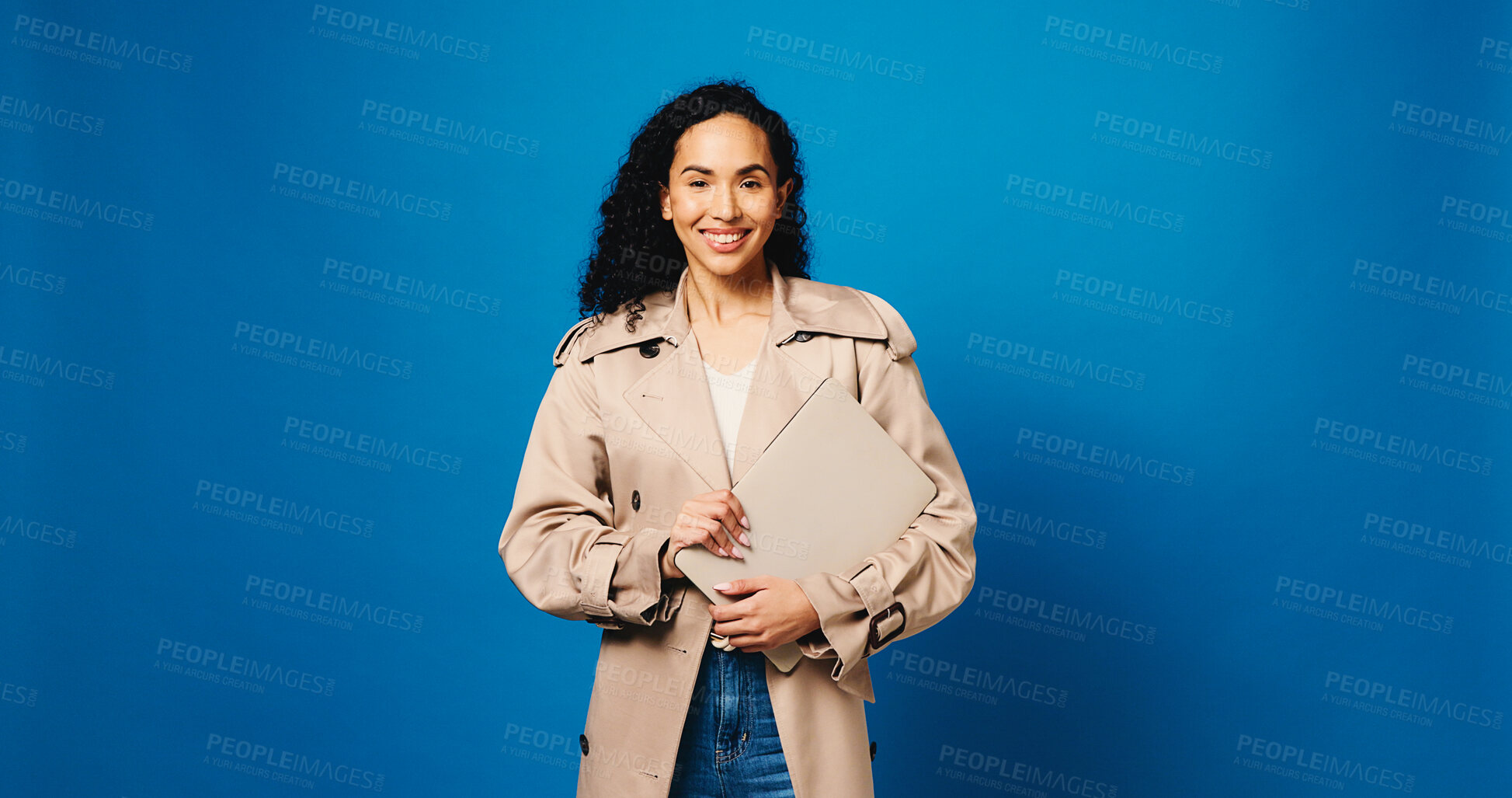 Buy stock photo Woman, portrait and smile in studio with pride, laptop and research for story on blue background. Journalist, happy and mockup space for report, article or draft for business newsletter or website