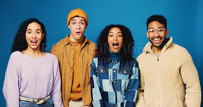Buy stock photo People, surprise and portrait with reaction to news in studio, announcement or expression on blue background. Group of friends, wow or shock with emotions, alert or mind blown with notification