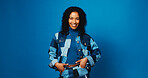 Happy, fashion and portrait of woman on blue background for trendy style, casual clothes and confidence. Mockup space, studio and person with positive attitude, smile and pride in denim for aesthetic