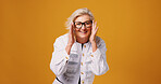 Glasses, orange background and portrait of mature woman for prescription lens, vision and spectacles. Frames, mockup space and happy person with confidence for optometry, fashion eyewear and sight