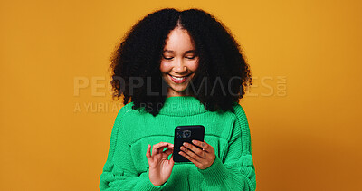 Buy stock photo Browsing, message and woman with smartphone, online and communication with contact on app and space. Reading, social media and person with smile for digital chat, texting and studio background