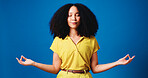 Eyes closed, yoga and woman in studio, meditation and chakra with hand gesture on blue background. Space, relax and person with balance, wellness and breathing with spiritual healing and mindfulness