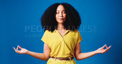 Buy stock photo Eyes closed, lotus pose and woman in studio, meditation and chakra with wellness on blue background. Space, relax and person with balance, yoga and breathing with spiritual healing and mindfulness