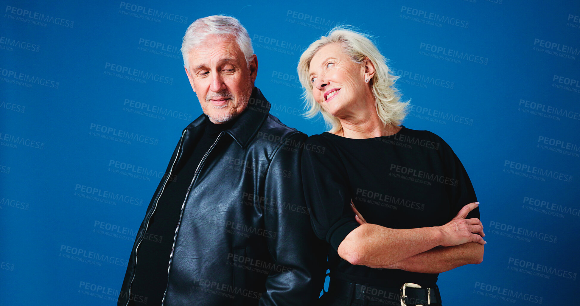 Buy stock photo Fashion, happy and senior couple in studio for trendy outfit, cool clothes and pose together. Marriage, space and mature man and woman with attitude, confidence and aesthetic on blue background