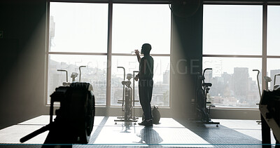 Buy stock photo Fitness, mature man or drinking water at gym for hydration, workout recovery or nutrition. Sunlight, window or back of athlete at sports club with liquid refresh for exercise break, thirsty or health