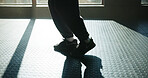 Legs, athlete and fitness with person at gym for preparation, start exercise and sports training. Feet, warm up and getting ready for workout, running challenge and cardio practice of marathon stance