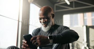 Buy stock photo Man, laughing and athlete with smartphone, gym or watching fitness video on social media or website. Happy, online and black person with mobile app for entertainment, funny post and break with tech