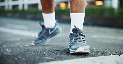 Buy stock photo Fitness, feet and shoes of person in road for cardio workout, running break and marathon training. Athlete, runner and sneakers in street for exercise routine, walking pause and resting on pavement