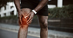 Runner, fitness and man with knee pain in city for exercise, workout and training outdoor. Sports, accident and hands of person with joint sprain, inflammation and injury for tendinitis in town
