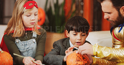 Buy stock photo Halloween, help and father with kids, decoration and holiday with fun, drawing and family party. Bonding together, home and dad with children, learning and creative art with celebration and pumpkin