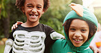 Hug, halloween and portrait of boy children outdoor together for celebration, fantasy or holiday. Bonding, costume and smile with best friends embracing in neighborhood for trick or treat tradition