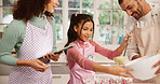 Baking, happy and child with parents in kitchen for learning, bonding or development in home. Smile, cooking and girl kid with mother and father for preparing dessert together on weekend in house.