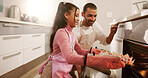 Baking, father and girl in kitchen, oven and bonding together with parent, learning and recipe. Home, happy family and dad with daughter, helping and teaching with skills, cooking and safety