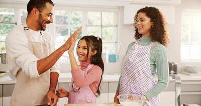 Buy stock photo Family, baking and high five in home kitchen with help, learning and teamwork success. People, child and together for teaching dessert, cake or recipe in house with celebration, pride and fun