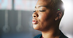 Breathing, calm and woman on break in gym, fitness and complete workout in morning, relax and peace. Rest, athlete and wellness for African person in health club, stress relief and done with exercise