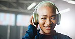 Fitness, headphones and smile of black woman in gym for sports, training or workout motivation. Exercise, music and streaming with happy African athlete on space for start of wellness routine