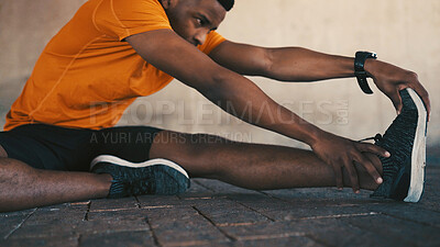 Buy stock photo Athlete, black man and stretching legs for fitness, exercise and preparation for training. Male person, warm up and getting ready for sports workout, flexibility and outdoor for marathon practice