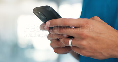 Buy stock photo Hands, phone and texting in hospital, hallway and chat on web, notification and contact at workplace. Person, smartphone and healthcare professional with mobile app for telehealth report at clinic