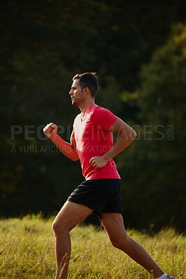 Buy stock photo Man, woods and trail running outdoors with athlete for endurance with physical fitness for training. Male person, back and cross country for workout routine, race and drill for performance in balance