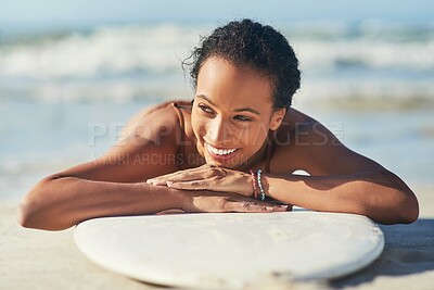 Buy stock photo Thinking, woman and relax on surfboard at beach on summer vacation, holiday or travel. Surfer, happy girl and lying on board at ocean for break, fitness and tourism outdoor at sea water in Mauritius