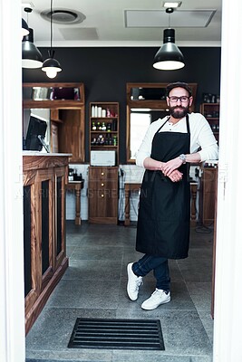 Buy stock photo Barber, shop and portrait of man for hair grooming, wellness and beard service. Professional, small business and confident person in barbershop, salon and parlor for haircare, career and styling