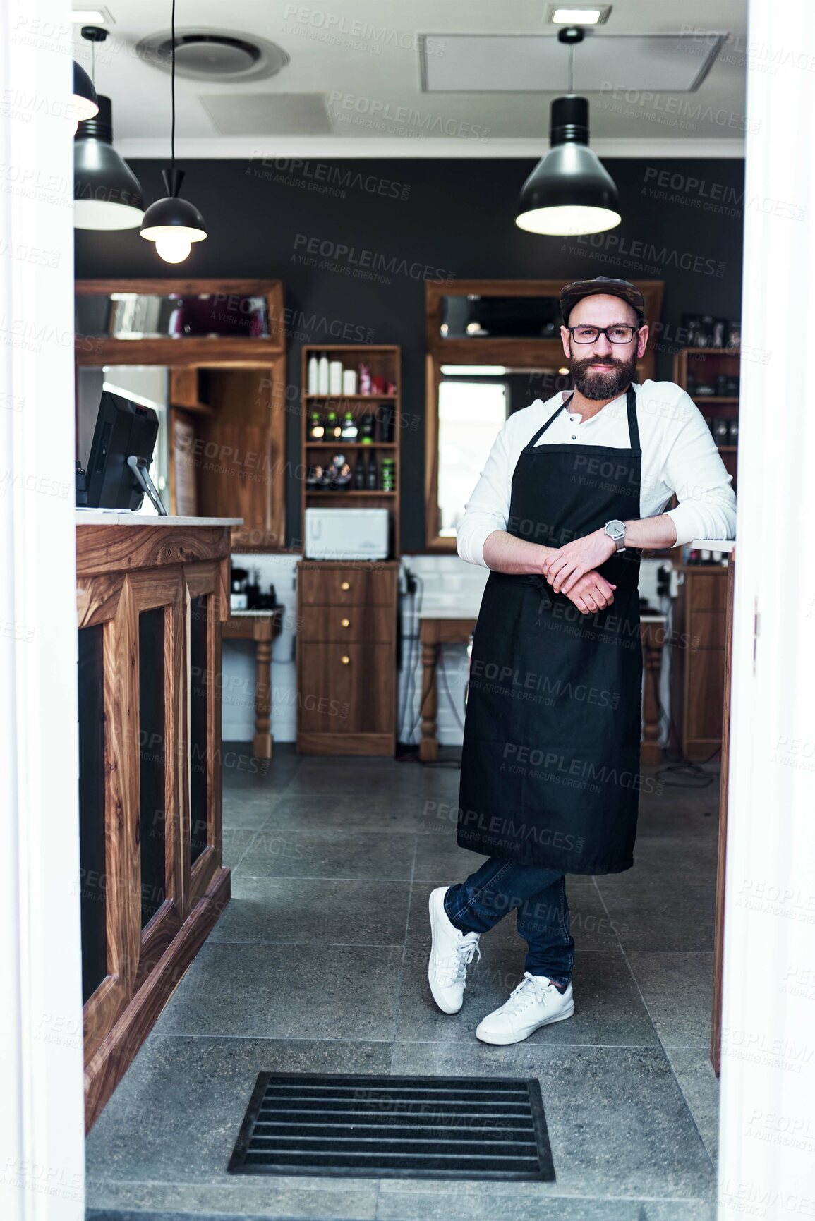 Buy stock photo Barber, shop and portrait of man for hair grooming, wellness and beard service. Professional, small business and confident person in barbershop, salon and parlor for haircare, career and styling