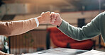 Fist bump, hands and business people with deal in office, agreement with trust or support for team mission. Partnership, collaboration or success with achievement, solidarity and gesture for goals
