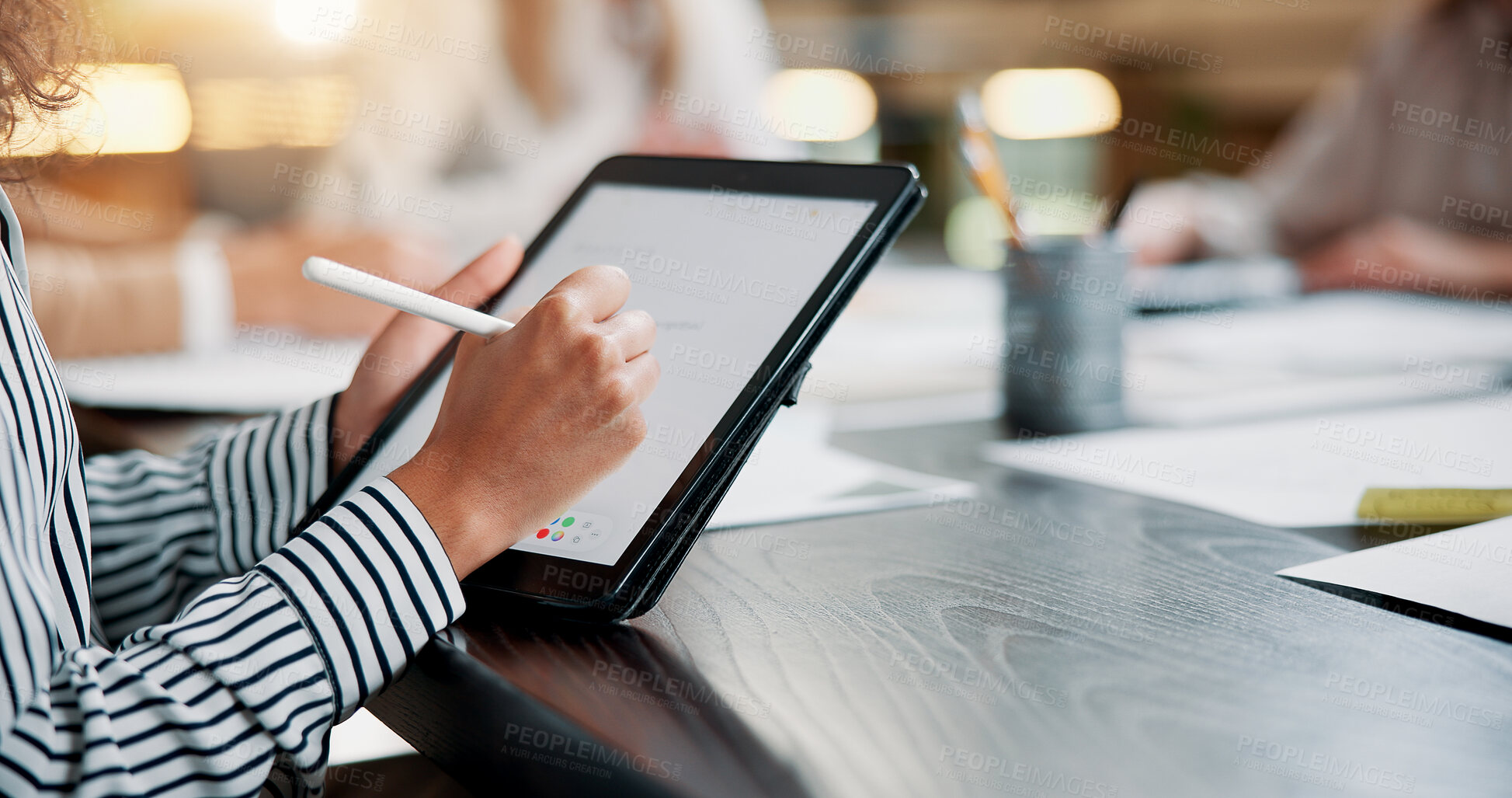 Buy stock photo Business person, hands and writing on tablet screen in meeting for website testing, campaign feedback or planning. Web designer, people and stylus pen at creative agency for app development and notes