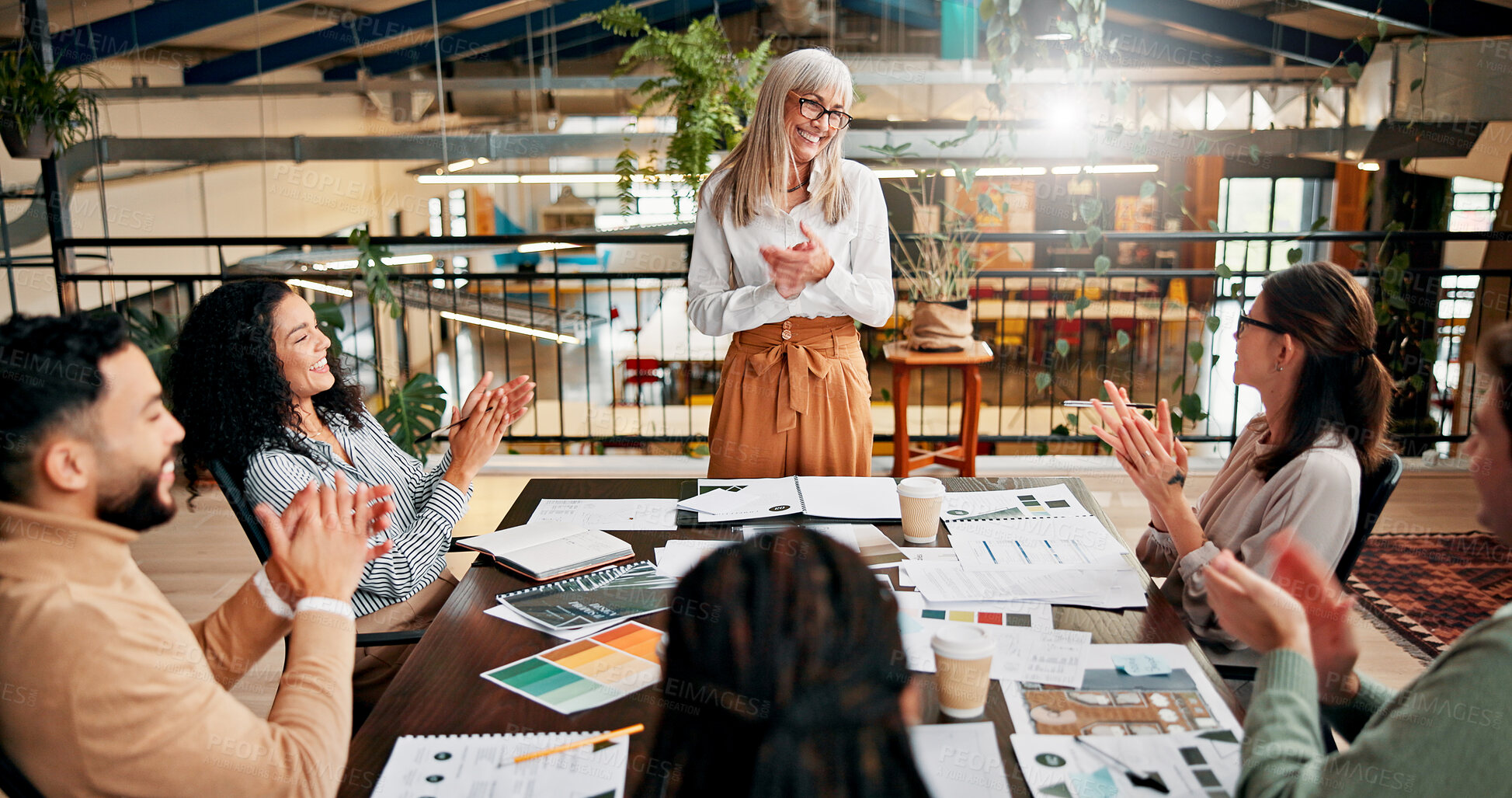 Buy stock photo Creative business, people and applause in meeting for campaign performance, KPI goals and branding success. Above, employees and clapping hands with paperwork for logo design approval and achievement