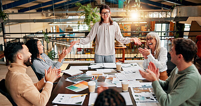 Buy stock photo Creative paperwork, team and applause in meeting for campaign performance, good news and project success. Design agency, above and people with clapping hands for marketing pitch approval and feedback