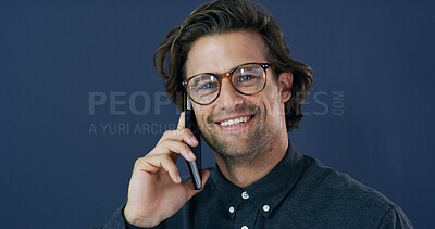 Buy stock photo Business, phone call and portrait of man in studio for conversation, negotiation or networking. Communication, discussion and smile with happy employee isolated on blue background for mobile update