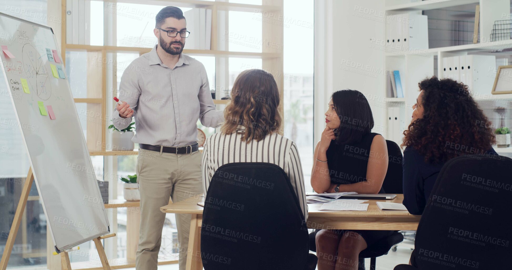 Buy stock photo Man, talking and presentation on whiteboard in office for marketing, sales update and feedback. Speaker, staff and explain information on company profit, KPI performance and pitch for revenue growth
