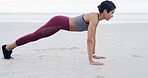 Athlete, woman and pushup for exercise at beach for fitness, strength training and strong muscles. Female person, weight and workout routine, body balance and sports performance for wellness at ocean