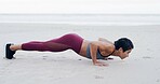 Athlete, woman and pushup for fitness at beach for exercise, strength training and strong muscles. Female person, weight and workout routine, body balance and sports performance for wellness at ocean