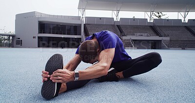 Buy stock photo Athlete, man and stretching at stadium for fitness, exercise and getting ready for marathon. Male person, relax and warm up muscles for training, runner workout and preparation of sports competition 