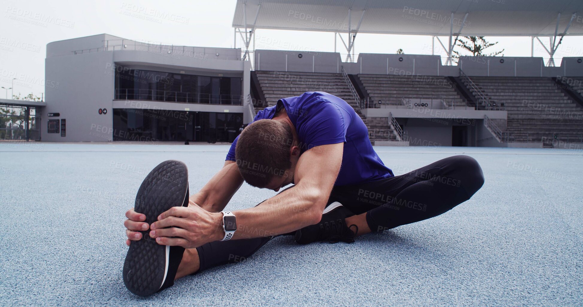 Buy stock photo Athlete, man and stretching at stadium for fitness, exercise and getting ready for marathon. Male person, relax and warm up muscles for training, runner workout and preparation of sports competition 