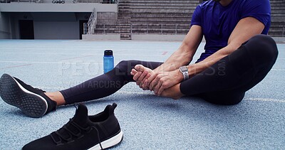 Buy stock photo Exercise, foot pain and man in stadium for injury, emergency or physical risk with training. Fitness, accident and massage with athlete or runner on track at venue for fatigue or muscle cramp