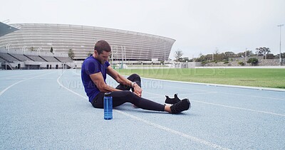 Buy stock photo Fitness, foot pain and man in stadium for accident, emergency or physical risk with training. Exercise, injury and massage with athlete or runner on track at venue for fatigue or muscle cramp