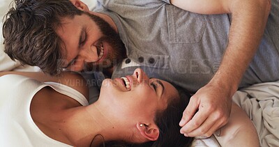Buy stock photo Love, relax and couple with laughing on bed for funny conversation, bonding together and support. Home, people and happy with affection in bedroom for relationship joke, marriage security and trust