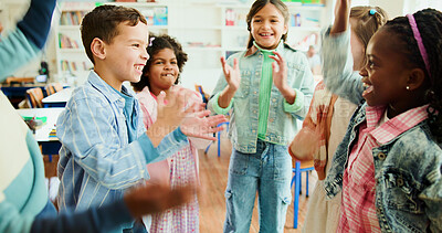 Buy stock photo Education, kids and applause in classroom together for learning, growth or development. Energy, smile and happy student children in back to school class for knowledge, excited friends and academics