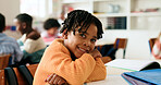 Boy, happy and portrait in classroom with arms crossed, pride and confidence for learning at academy. Kid, smile learner and pupil for education, face or development with books at elementary school