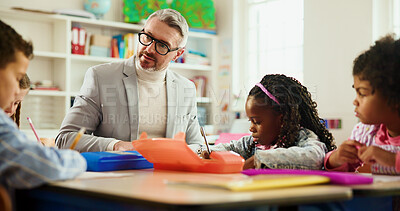 Buy stock photo Education, learning or study with children and teacher at desk in classroom for child development. Future, growth and teaching students with educator man in elementary school class for lesson