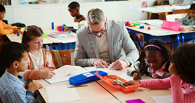 Buy stock photo Education, man and teacher with children, classroom or knowledge for growth, development or writing. School, educator and person with assignment for kids, learning and curriculum in elementary